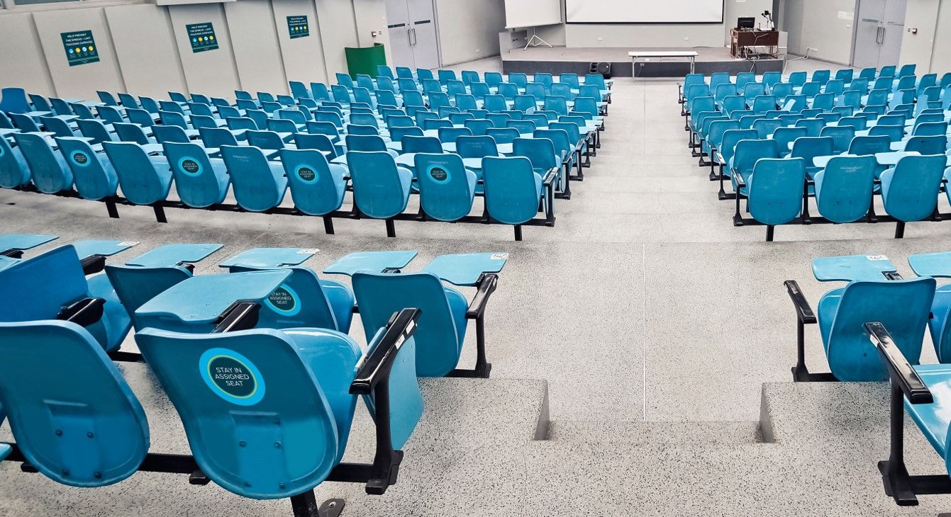 Lecture Room with Reopening Signage